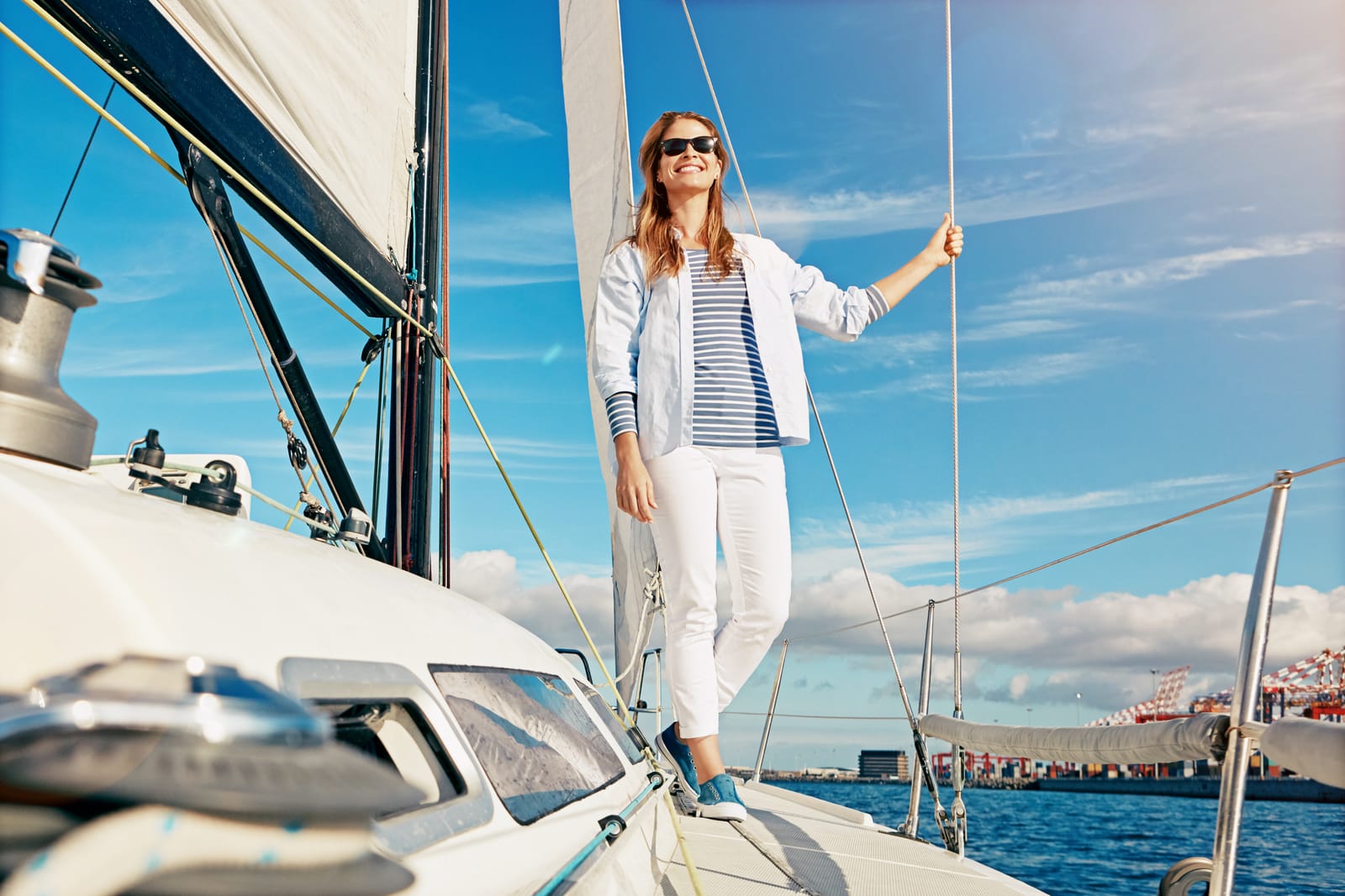 happy woman on a sailing yacht