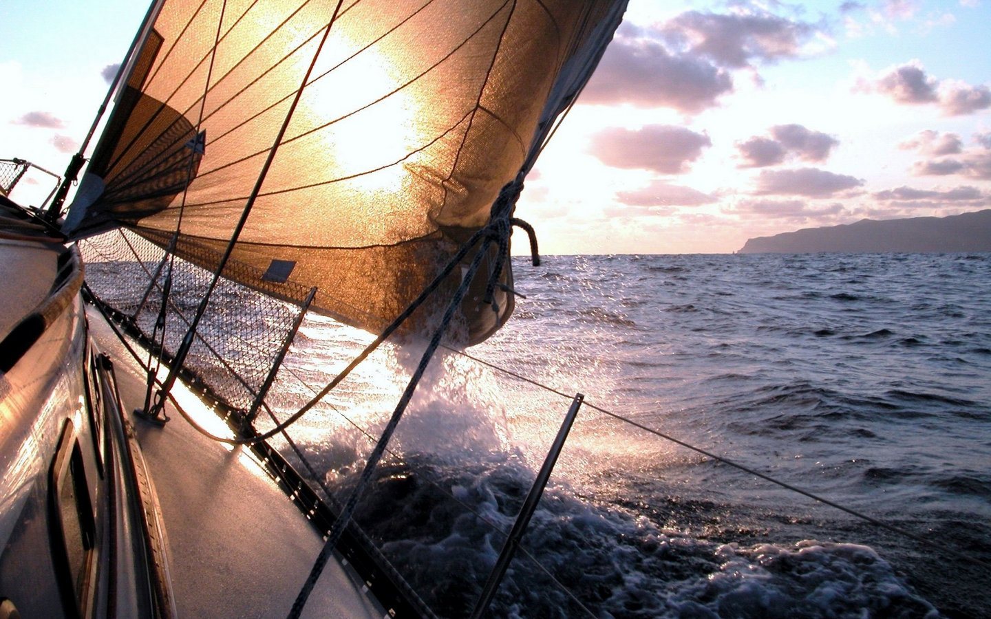 yacht sailing sunset